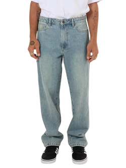 Light blue jeans worn by a person on a white background