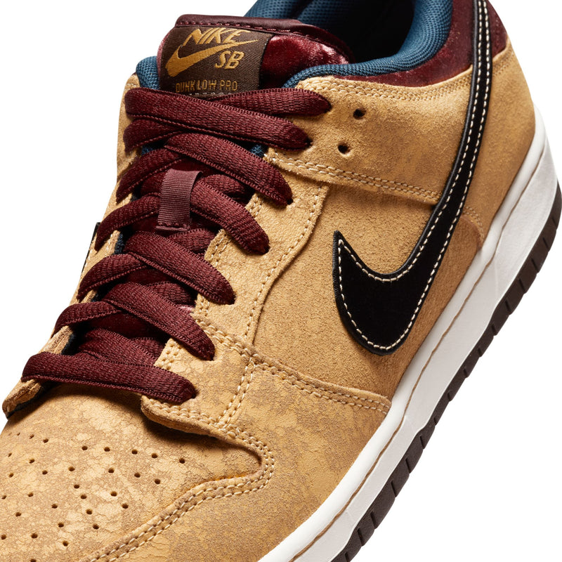 Nike SB Dunk Low Pro "City of Cinema" - Celestial Gold / Black / Team Red