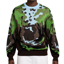 Person wearing a camouflage-patterned sweatshirt on a white background