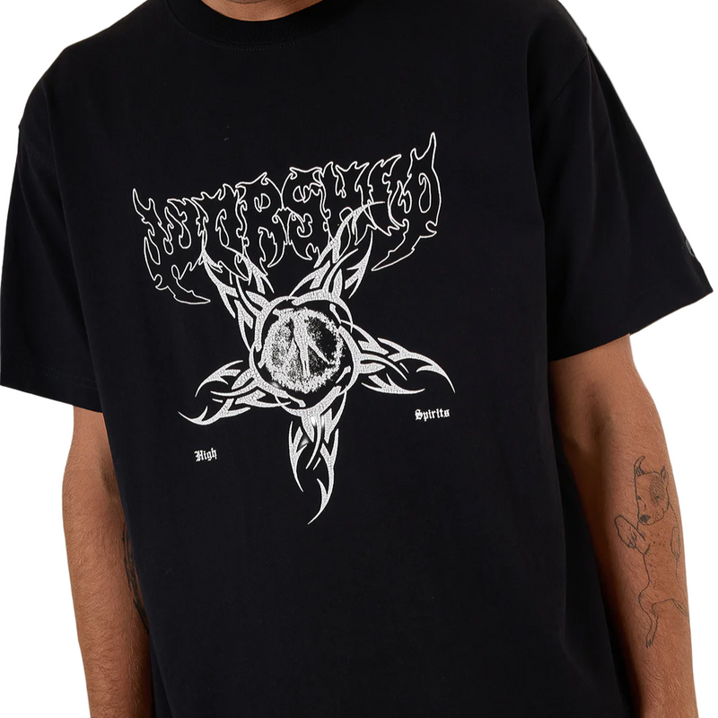 Person wearing a black t-shirt with white graphic design on a plain background