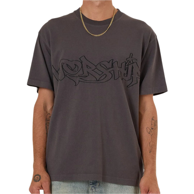 Man wearing a dark gray t-shirt with a logo on a white background