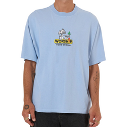 Person wearing a light blue t-shirt with a graphic design on a white background