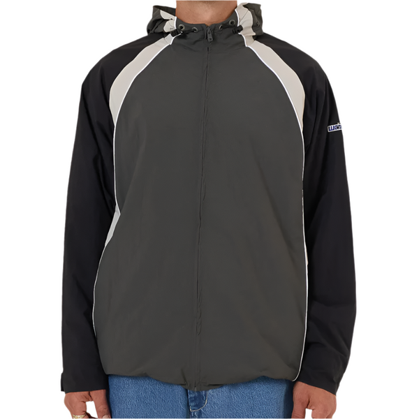 Man wearing a black and gray jacket with a hood on a white background