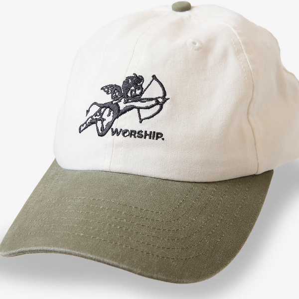 Beige and green cap with 'Worship' logo on a white background