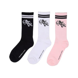 Three socks in black, white, and pink with a design on a white background