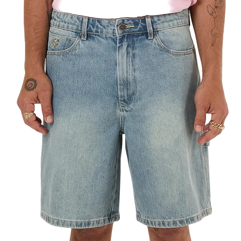 Light blue denim shorts worn by a person on a white background
